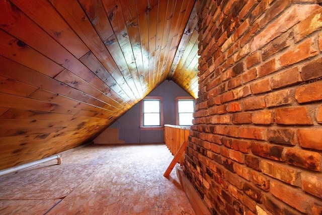 bonus room featuring vaulted ceiling and wood ceiling