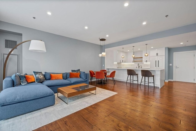 living room with light hardwood / wood-style floors