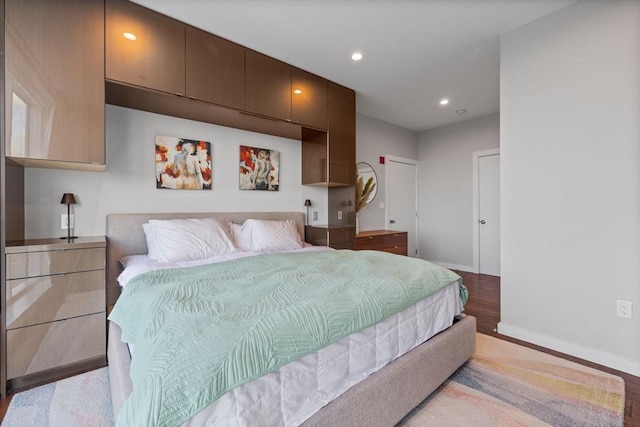 bedroom with light hardwood / wood-style flooring