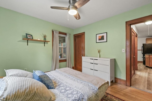 109 Euclid Ave, Pittsfield, MA 01201 - bedroom featuring light wood-type flooring, freestanding refrigerator, and a ceiling fan