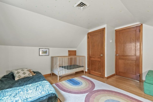 109 Euclid Ave, Pittsfield, MA 01201 - bedroom featuring light wood finished floors and vaulted ceiling