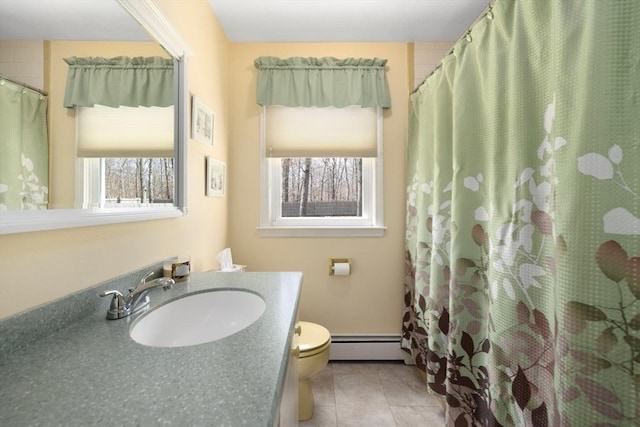 bathroom with tile patterned flooring, curtained shower, toilet, vanity, and a baseboard radiator