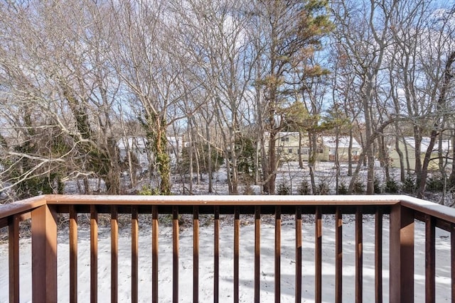 view of snow covered deck