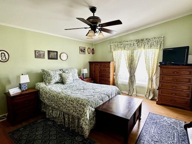 1408 Fox Run, Middleboro, MA 02346 - bedroom with wood finished floors, ornamental molding, and ceiling fan