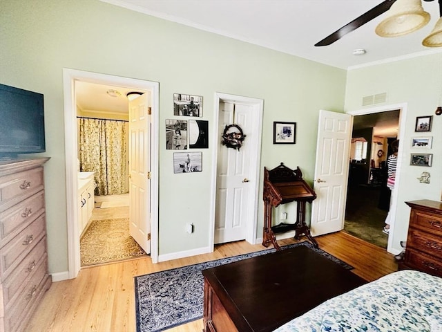 1408 Fox Run, Middleboro, MA 02346 - bedroom featuring light wood-style floors, crown molding, ensuite bath, and a ceiling fan