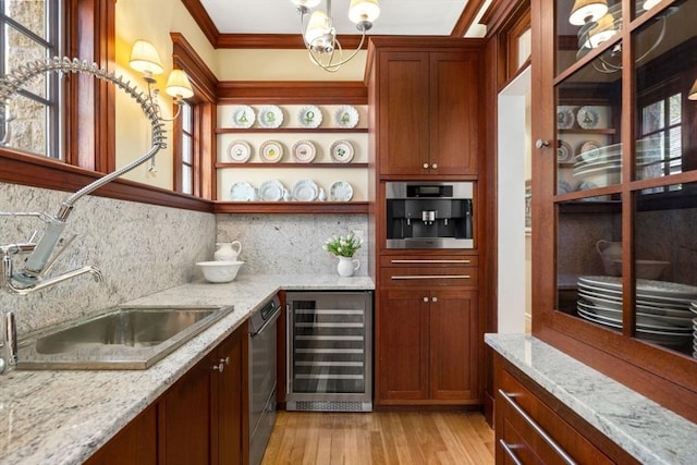 bar featuring wine cooler, a sink, light wood-style floors, decorative backsplash, and ornamental molding