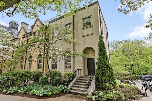 60 Glen Rd Unit 201, Brookline, MA 02445 - view of front of property with stucco siding