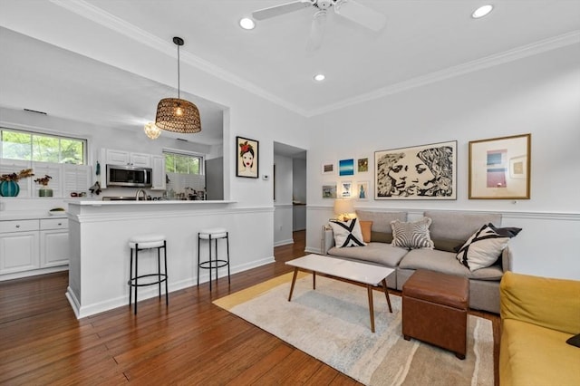 60 Glen Rd Unit 201, Brookline, MA 02445 - living room with dark wood finished floors, recessed lighting, ceiling fan, and ornamental molding