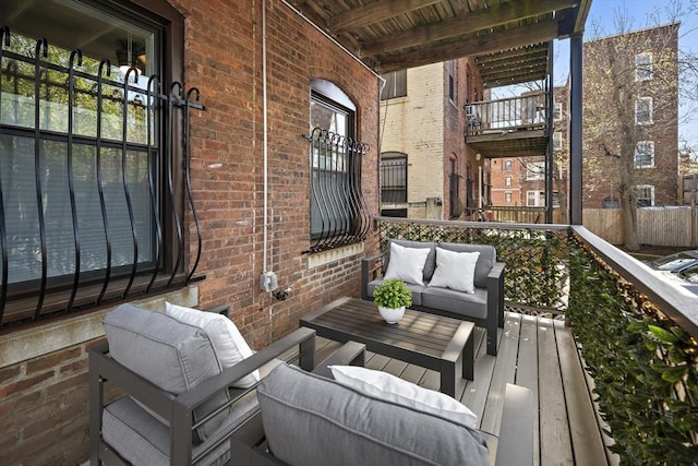 wooden deck with outdoor lounge area