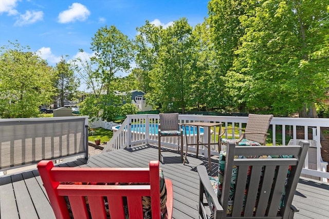 10 Lisa Ln, Reading, MA 01867 - deck featuring an outdoor pool and a fenced backyard