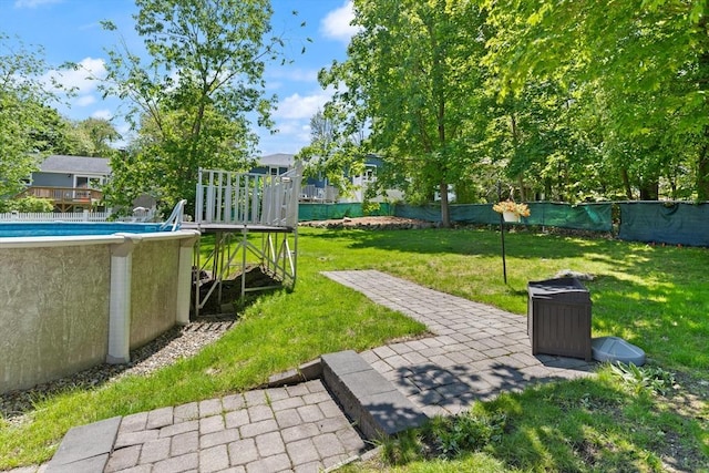 10 Lisa Ln, Reading, MA 01867 - view of yard featuring an outdoor pool
