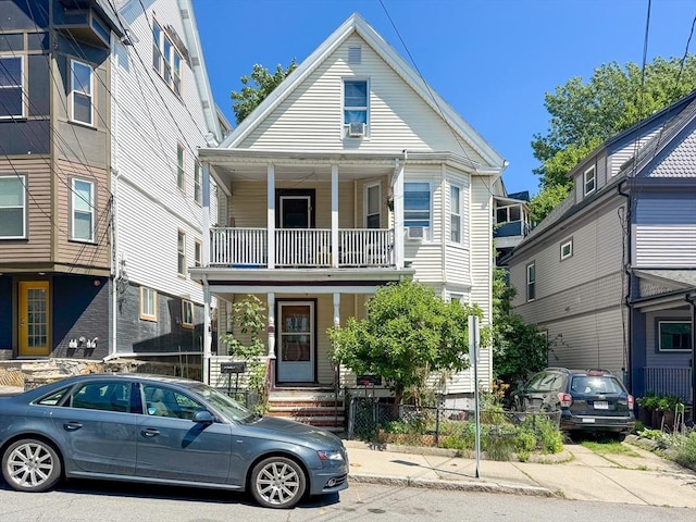 57 Bartlett St, Somerville, MA 02145 - view of front of house with a balcony