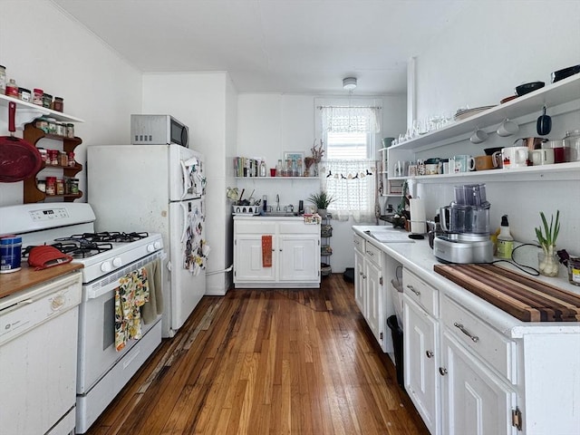 57 Bartlett St, Somerville, MA 02145 - kitchen featuring open shelves, white appliances, white cabinets, and light countertops