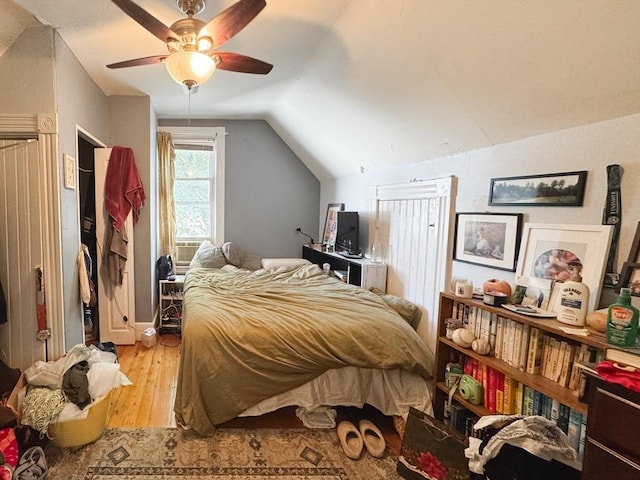 57 Bartlett St, Somerville, MA 02145 - bedroom with lofted ceiling, light wood-type flooring, and a ceiling fan
