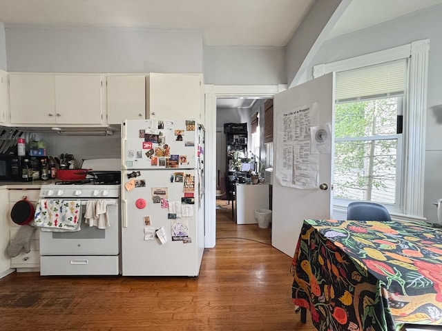 57 Bartlett St, Somerville, MA 02145 - kitchen featuring white appliances, wood finished floors, and white cabinets
