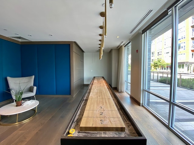 recreation room with hardwood / wood-style flooring