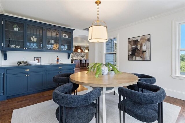 197-199 Winchester St, Brookline, MA 02446 - dining room with ornamental molding, dark wood finished floors, and baseboards