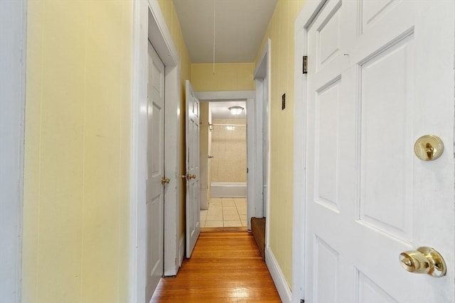 hallway featuring light wood-type flooring