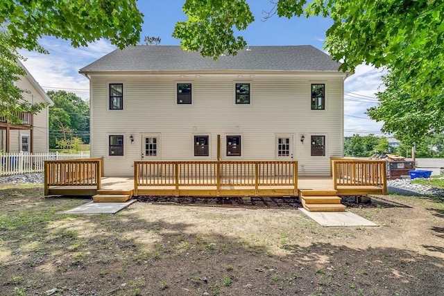 rear view of house with a deck