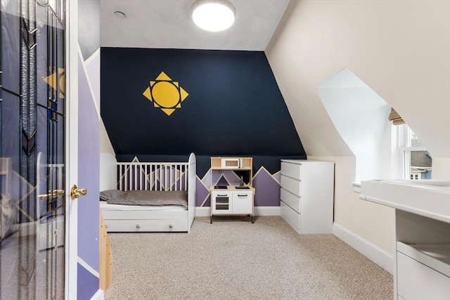 bedroom featuring vaulted ceiling, carpet flooring, and baseboards
