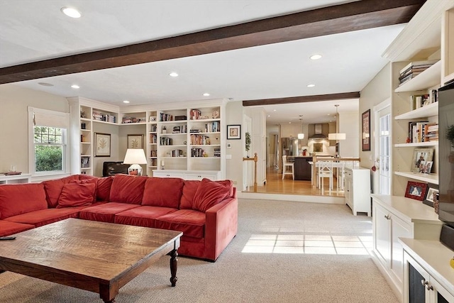74 Charter Rd, Acton, MA 01720 - living area with light colored carpet, recessed lighting, beamed ceiling, and built in features