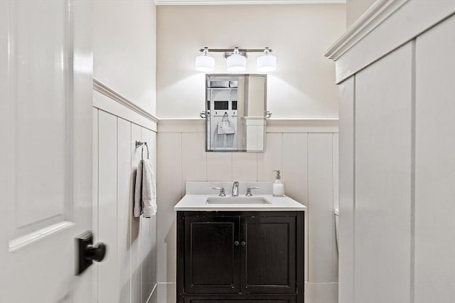 74 Charter Rd, Acton, MA 01720 - bathroom with a wainscoted wall, a decorative wall, and vanity