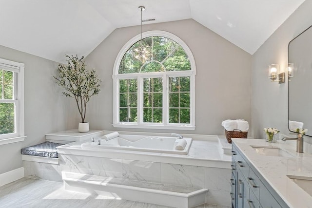 74 Charter Rd, Acton, MA 01720 - full bathroom featuring plenty of natural light, vaulted ceiling, a garden tub, and double vanity