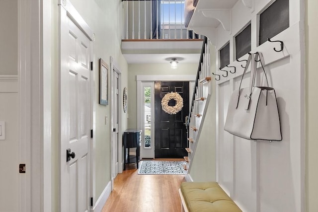 74 Charter Rd, Acton, MA 01720 - foyer entrance featuring light wood finished floors and stairs