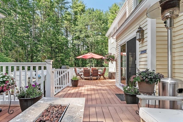 74 Charter Rd, Acton, MA 01720 - wooden terrace featuring outdoor dining space
