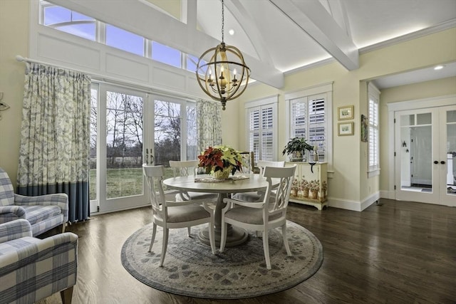 dining space featuring dark hardwood / wood-style floors, high vaulted ceiling, beamed ceiling, a chandelier, and french doors