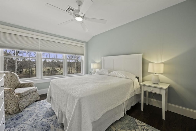 bedroom featuring wood-type flooring, ceiling fan, and vaulted ceiling