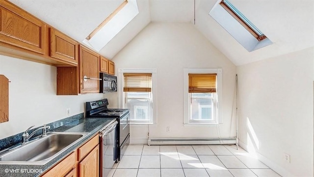 kitchen featuring black appliances, a sink, dark countertops, light tile patterned floors, and a baseboard radiator