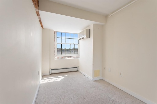 unfurnished room with a baseboard radiator, carpet, baseboards, and a wall unit AC