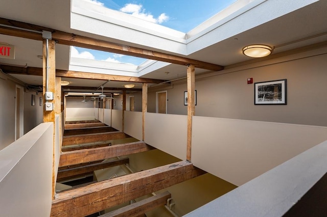 finished below grade area featuring stairway