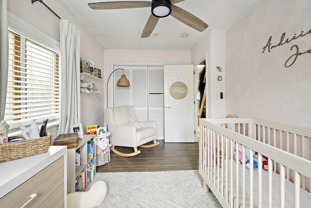 50 Triton Ave, Winthrop, MA 02152 - bedroom featuring a crib, wood finished floors, ceiling fan, and a closet