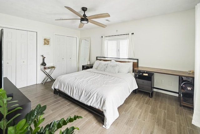 50 Triton Ave, Winthrop, MA 02152 - bedroom with multiple closets, wood finished floors, and a ceiling fan