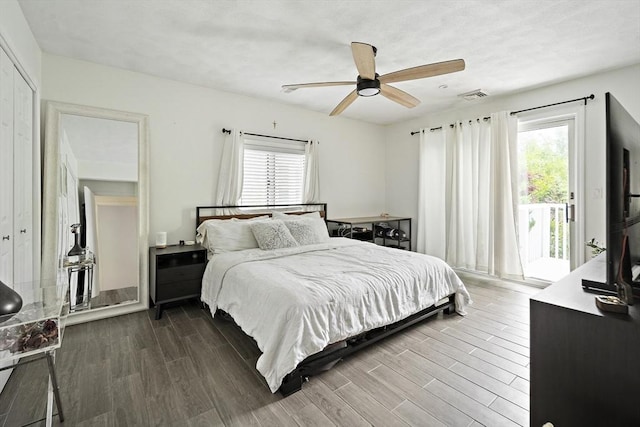 50 Triton Ave, Winthrop, MA 02152 - bedroom with access to exterior, multiple windows, wood finished floors, and ceiling fan