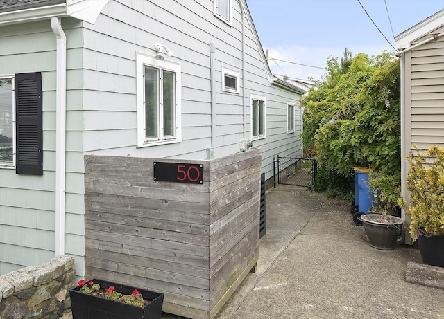 50 Triton Ave, Winthrop, MA 02152 - view of side of home with a gate