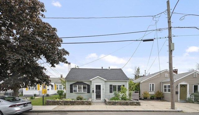 50 Triton Ave, Winthrop, MA 02152 - bungalow-style house featuring a chimney and roof with shingles