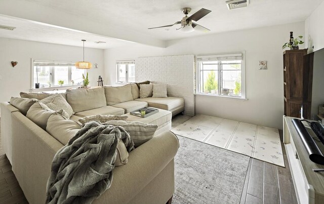 50 Triton Ave, Winthrop, MA 02152 - living room with a ceiling fan, plenty of natural light, and wood finished floors