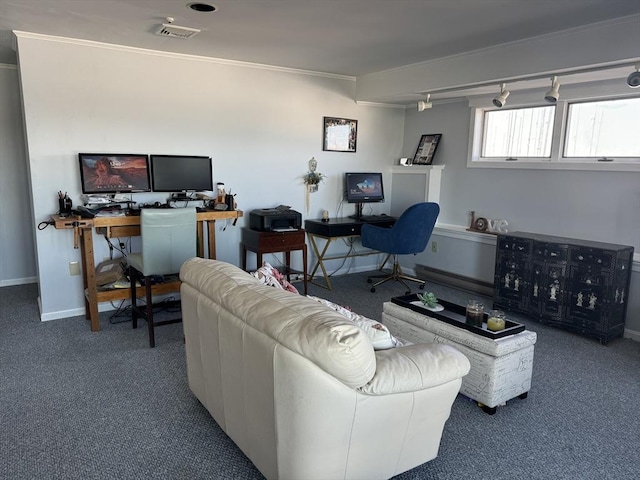office space with carpet flooring, ornamental molding, and baseboards