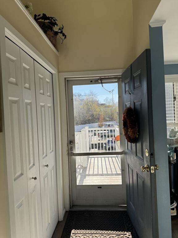 doorway to outside with healthy amount of natural light