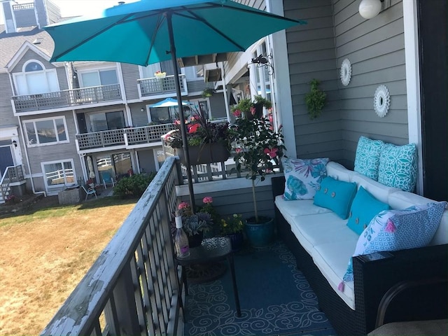 balcony with an outdoor hangout area