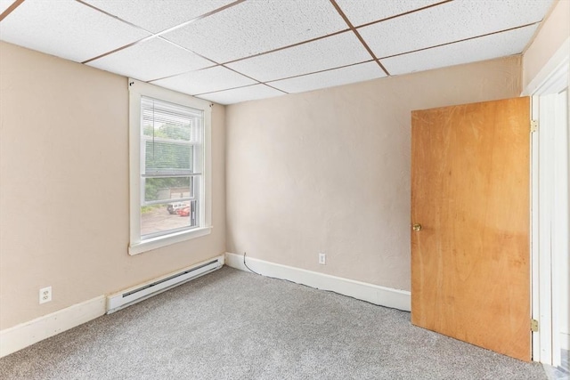 342 Broadway, North Attleboro, MA 02760 - spare room with a baseboard heating unit, a paneled ceiling, and carpet floors