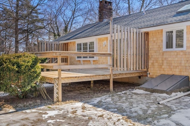 view of snow covered deck