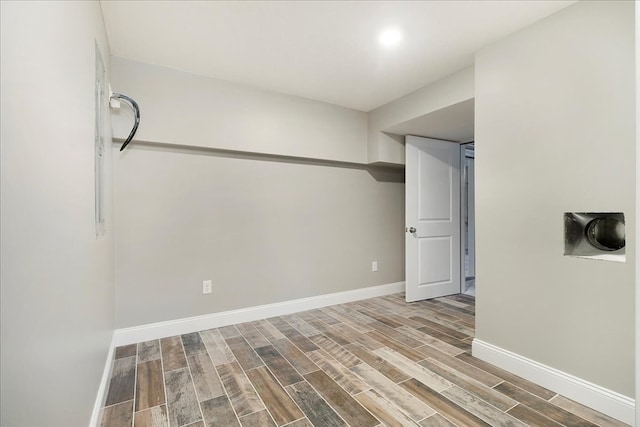 spare room with hardwood / wood-style floors