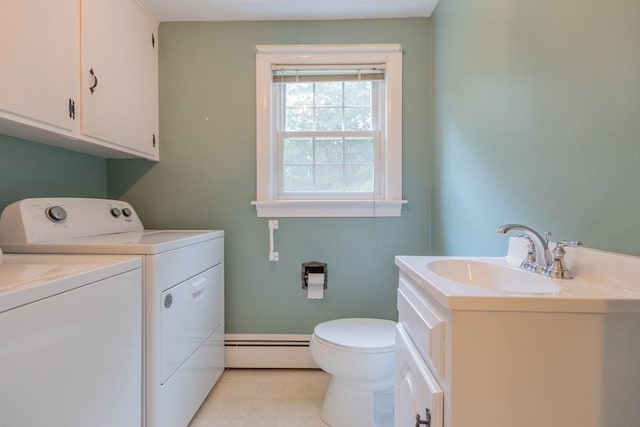 22 Liberty St, Bellingham, MA 02019 - bathroom featuring washer and clothes dryer, a baseboard heating unit, and vanity