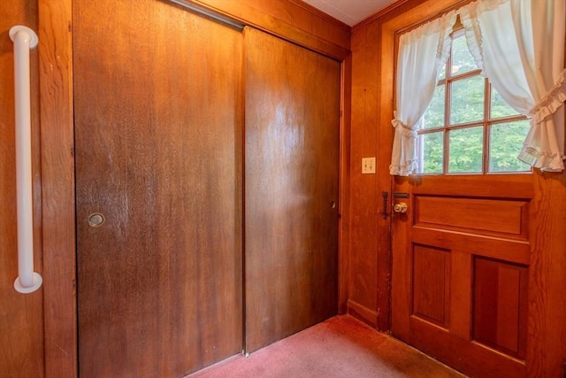 22 Liberty St, Bellingham, MA 02019 - doorway with carpet and wooden walls