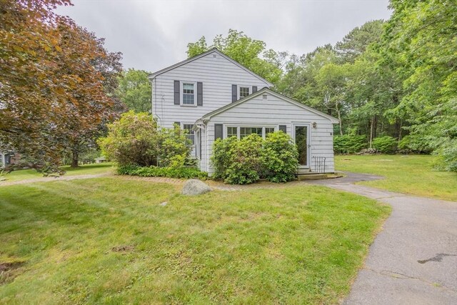 22 Liberty St, Bellingham, MA 02019 - view of front facade featuring a front yard