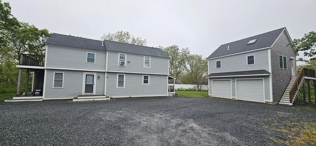 7 Candle Maker Cir, Edgartown, MA 02539 - rear view of house featuring an attached garage